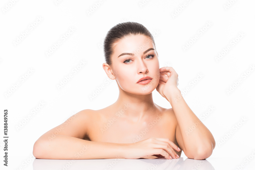 Beauty Portrait. Beautiful Spa Woman Touching her Face. Perfect Fresh Skin. Isolated on White Background. Pure Beauty Model. Beauty Portrait. Beautiful Spa Woman Touching her Face. Perfect Fresh Skin. Isolated on White Background. Pure Beauty Model.