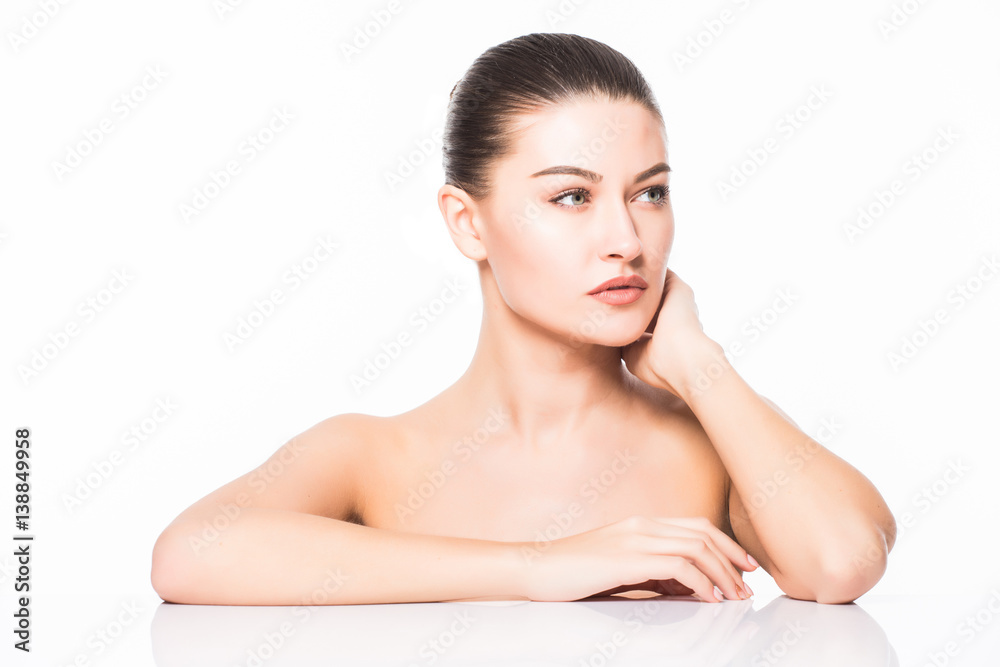 Beauty Portrait. Beautiful Spa Woman Touching her Face. Perfect Fresh Skin. Isolated on White Background. Pure Beauty Model. Beauty Portrait. Beautiful Spa Woman Touching her Face. Perfect Fresh Skin. Isolated on White Background. Pure Beauty Model.