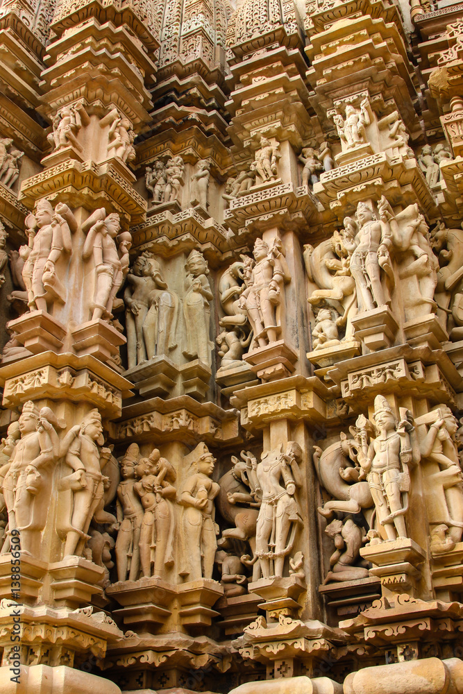 Close up of artful ancient carvings, Khajuraho Group of Monuments, India