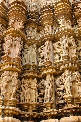 Close up of artful ancient carvings, Khajuraho Group of Monuments, India