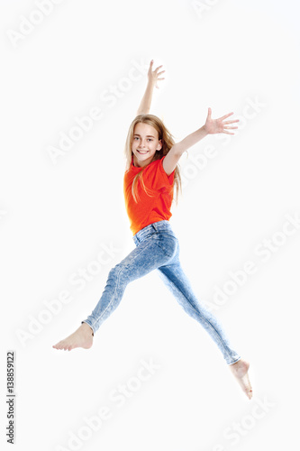 Young Girl with Blond Hair Jumping