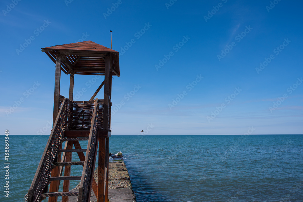 Seascape, pebble beach, pier, tower rescue, lookout tower