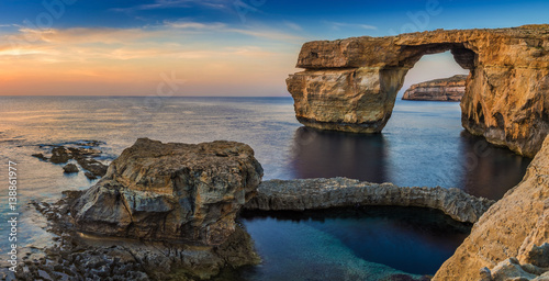 Gozo, Malta - Panoramic view of the beautiful Azure Window, a natural arch and famous landmark on the island of Gozo at sunset © zgphotography