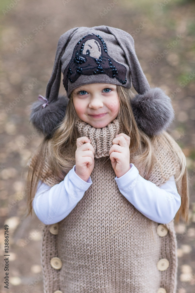 Fototapeta premium child knitted jacket walking