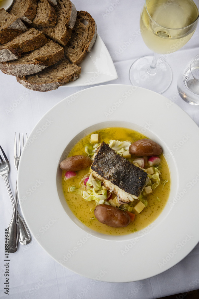 Fish dish at a restaurant, Henningsvaer, Lofoten Islands, Norway. Fish dish at a restaurant, Henningsvaer, Lofoten Islands, Norway.