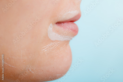 Close up woman in facial peel off mask.