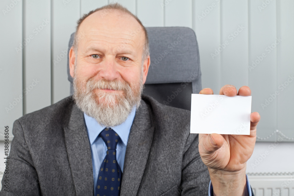 Manager showing business card Manager showing business card