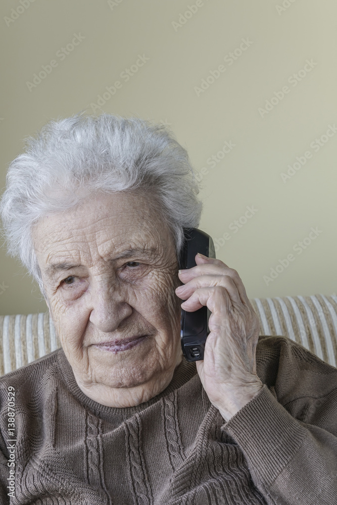 Thoughtful senior woman on phone Thoughtful senior woman on phone