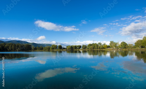 The beautiful Lago di Marrucco near the village of Calcinaia, Toskany, Italy photo