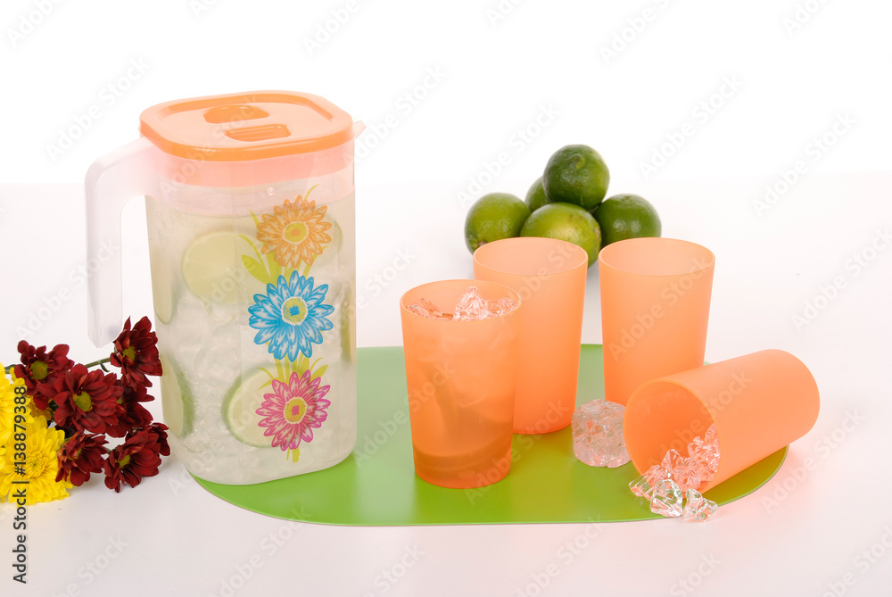 pitcher for juice and four plastic cups pitcher for juice and four plastic cups