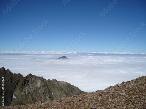 Beautiful clouds and fog among rock mountain. Pyrenees mountains in France landscape