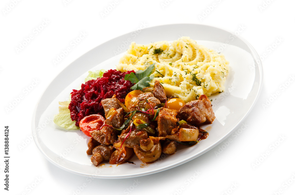 Goulash with mashed potatoes and vegetables 