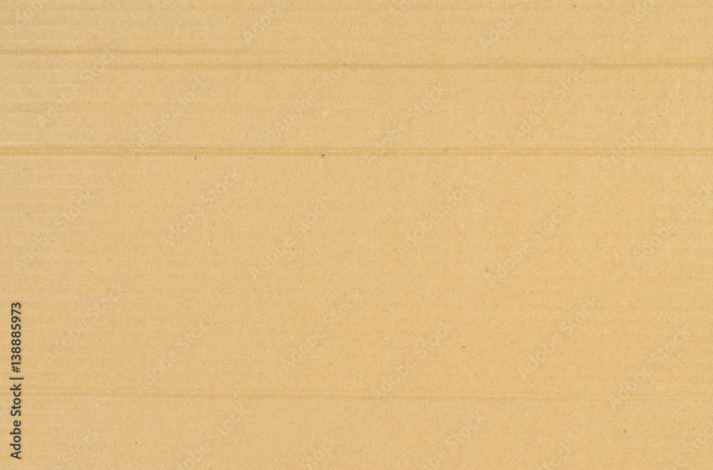 Surface of a brown cardboard suitable for background Surface of a brown cardboard suitable for background