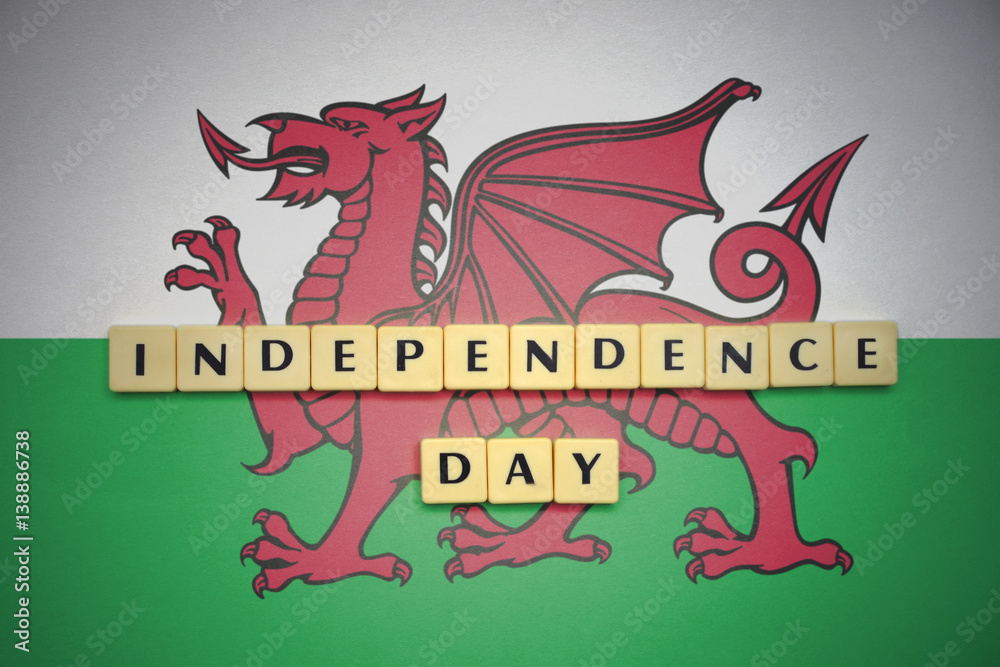 letters with text independence day on the national flag of wales.