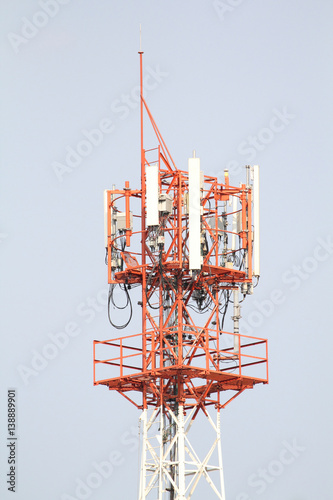 The big telecommunication tower with blue sky, as background or print card.