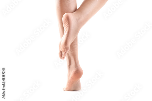 Healthy female legs on white background photo