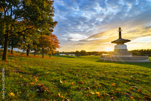 Peace Pagoda temple at sunrise in Willen Park, Milton Keynes, UK photo