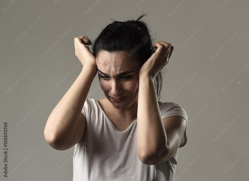 beautiful and sad woman crying desperate and depressed with tears on her eyes suffering pain beautiful and sad woman crying desperate and depressed with tears on her eyes suffering pain