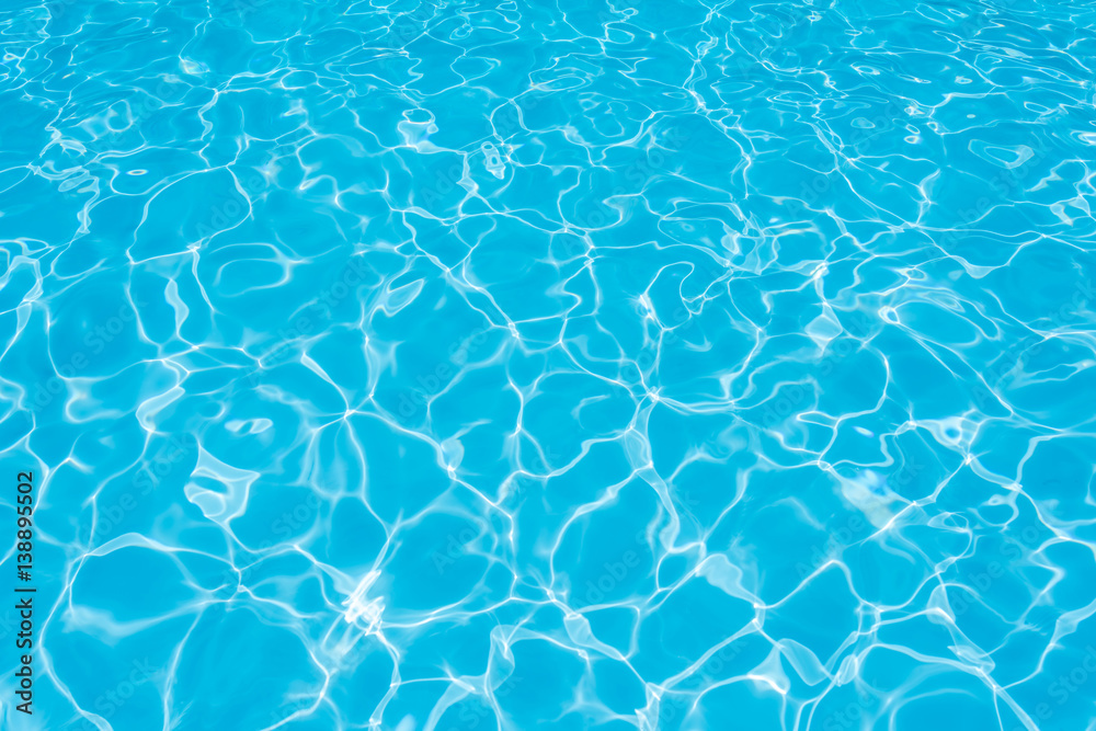 Blue and bright ripple water and surface in swimming pool , Beautiful motion gentle wave in pool Blue and bright ripple water and surface in swimming pool , Beautiful motion gentle wave in pool
