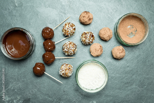 Overhead of Energy Balls, Melted and Powder Chocolate, and Coconut