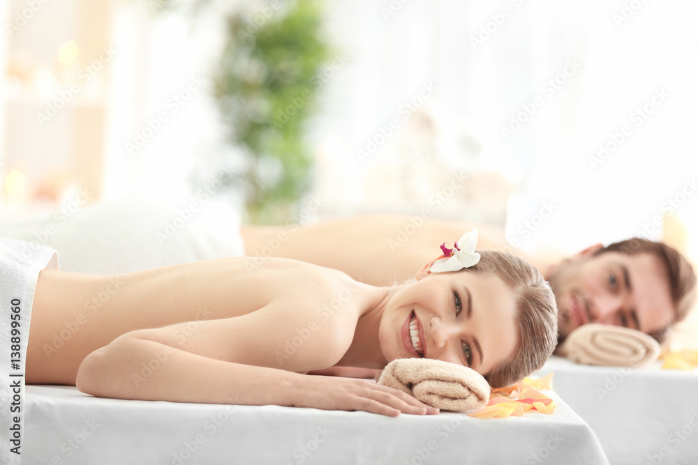 Young happy couple relaxing in spa salon Young happy couple relaxing in spa salon