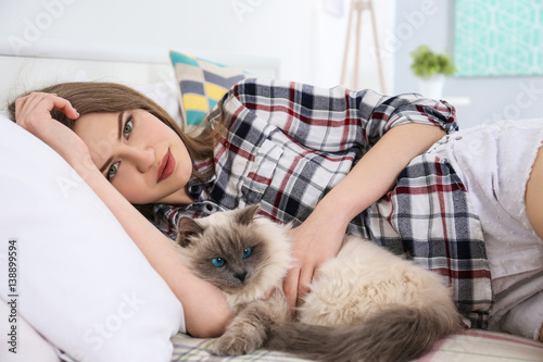 Beautiful young woman with ...