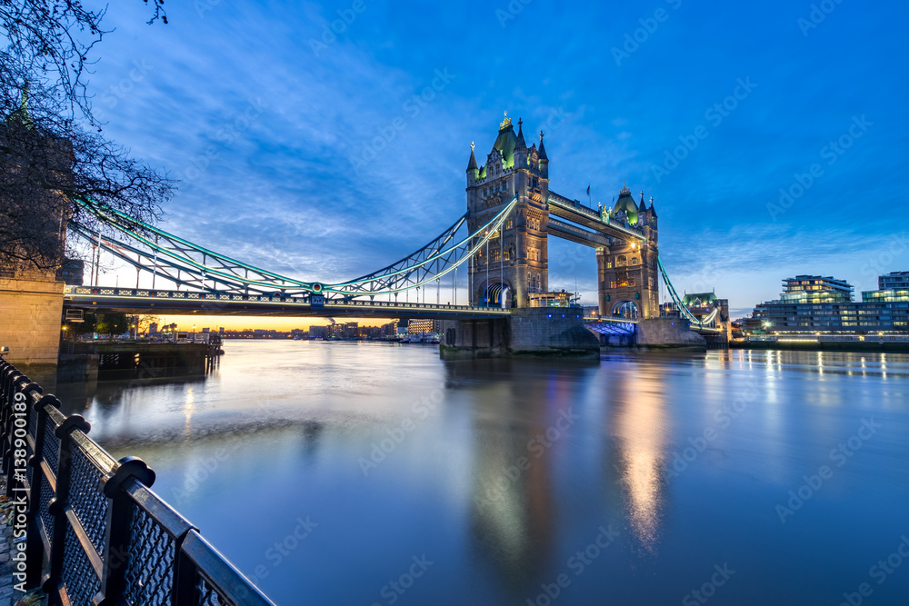 London Tower Bridge and Thames river viewed at sunrise in London, England