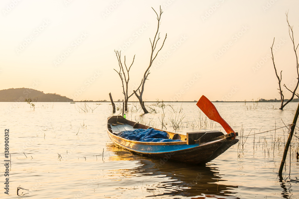 Fototapeta premium small fishing boat at Bang Phra Reservoir Sriracha,Chonburi, Thailand.