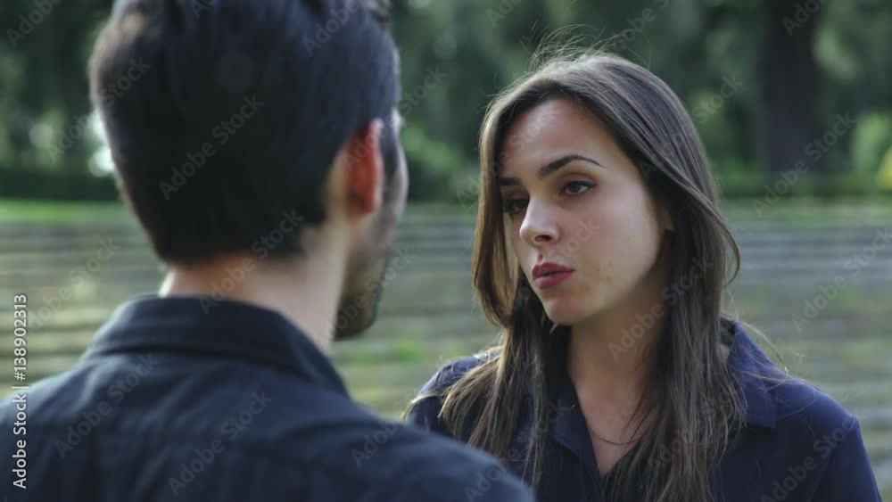 cute girl at the park is leaving the boyfriend