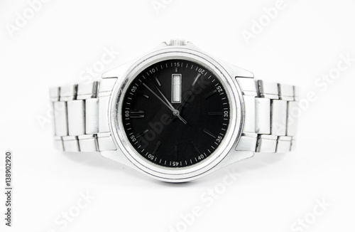 steel watch with black face on isolated