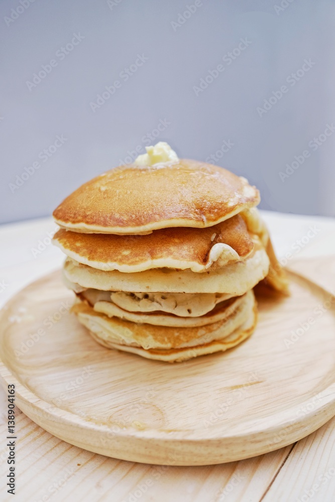 Pancakes in dish on Table wood Pancakes in dish on Table wood