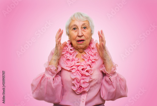 Elderly surprised woman
