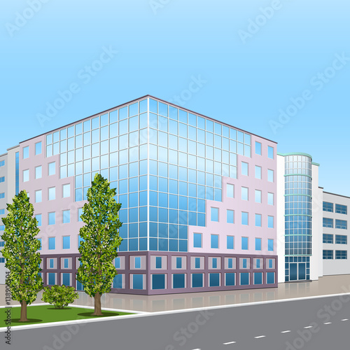 office building with the entrance and a reflection