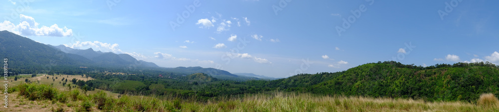 panorama view, Green meadow in the mountain are under the blue sky