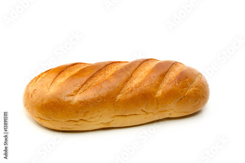 A loaf of wheat bread isolated on white background