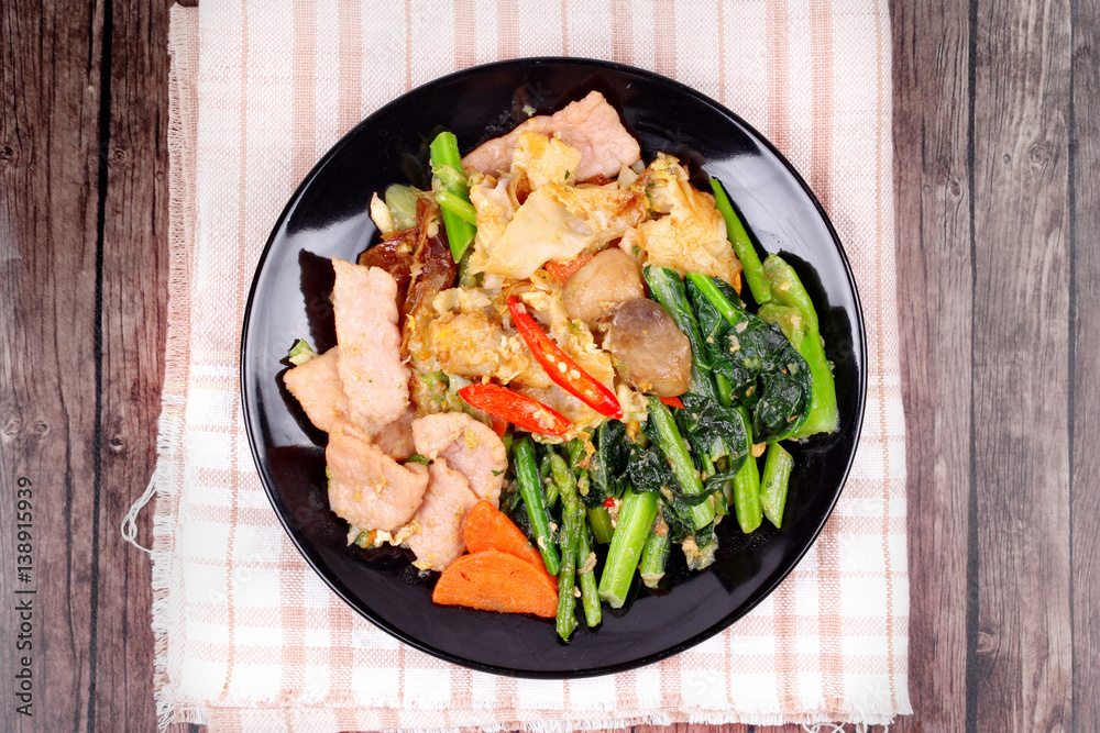 Fried big noodle topped mixed vegetables for organic food. Fried big noodle topped mixed vegetables for organic food.
