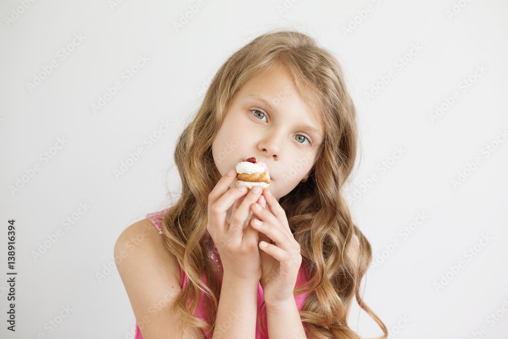 little girl holding a delicious appetizing cake little girl holding a delicious appetizing cake