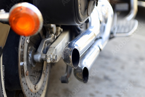 chrome exhaust on vintage motorcycle