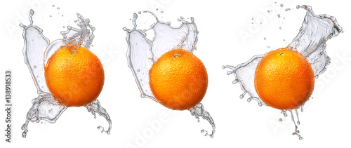 Water splash and fruits isolated on white backgroud. Fresh orange