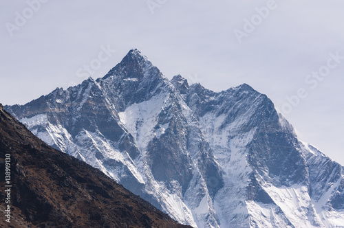 Lhotse mountain peak in cloudy day, Dingboche, Everest region, Nepal