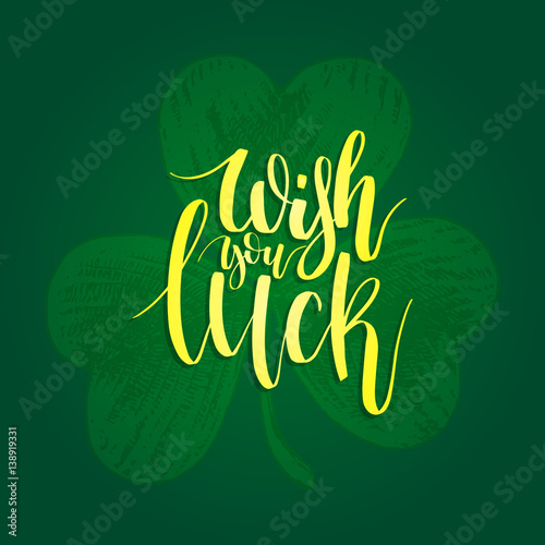 Vector Happy Saint Patrick's Day hand lettering greetings card or poster design. Sketched illustration of irish shamrock