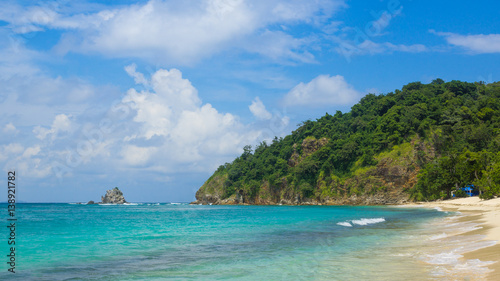 Tropical Beach Scene With Rocky Island © nathanallen