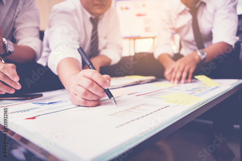 Wallpaper Mural Business people meeting to discuss the situation on the market. close up hands Torontodigital.ca