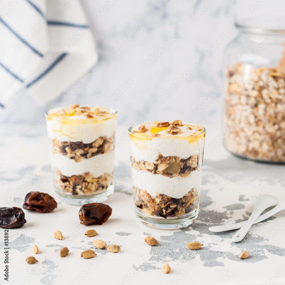 Spiced Yogurt with Granola in Glasses Spiced Yogurt with Granola in Glasses