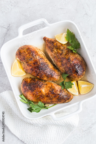 roasted chicken breast with lemon and spicy herbs