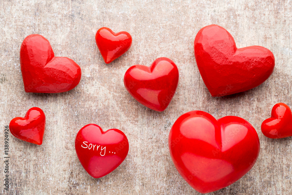 Fototapeta premium Red heart on the wooden background.
