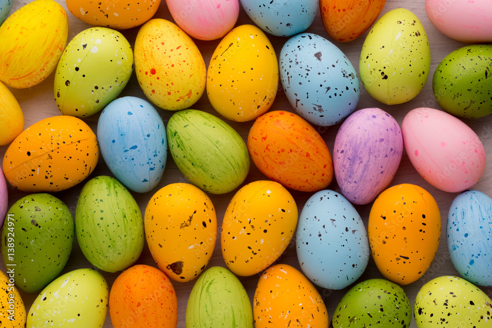 Small multicolored Easter eggs. Spring background. Small multicolored Easter eggs. Spring background.