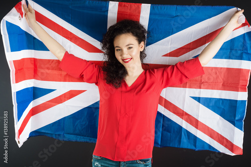 British woman holding the Jack Union flag