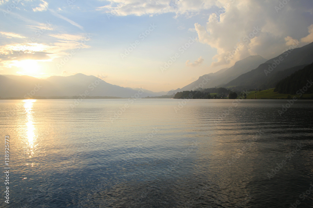 Travel to Sankt-Wolfgang, Austria. The view on the lake with the mountains on the background in the sunny day.
