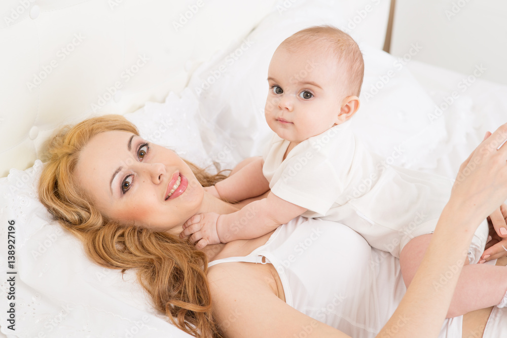 Mother playing with baby. Mother playing with baby.